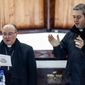 FILE - Archbishop Charles Scicluna, left, and Spanish Monsignor Jordi Bertomeu attend a meeting with the Catholic community at the Sacred Heart of Jesus church in Osorno, Chile, in this Saturday, June 16, 2018 file photo. The Vatican is sending its top two sex crimes investigators to Mexico on a fact-finding and assistance mission as the Catholic hierarchy in the world&#39;s second-largest Catholic country begins to reckon with decades of clergy sex abuse and cover-up. (AP Photo/Fernando Lavoz)