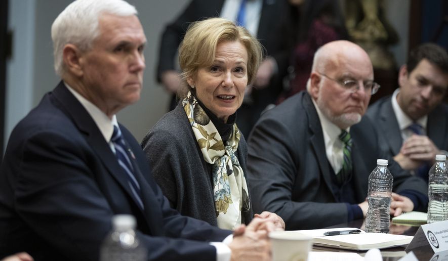 White House coronavirus response coordinator Dr. Deborah Birx, with Vice President Mike Pence, left, and Director of the Centers for Disease Control and Prevention Robert Redfield, speaks during a coronavirus briefing with Diagnostic Lab CEOs in at the Roosevelt Room of the White House, Wednesday, March 4, 2020, in Washington. (AP Photo/Manuel Balce Ceneta)
