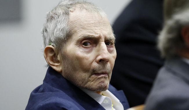 Real estate heir Robert Durst sits during his murder trial at the Airport Branch Courthouse in Los Angeles on Wednesday, March 4, 2020. After a Hollywood film about him, an HBO documentary full of seemingly damning statements, and decades of suspicion, Durst is now on trial for murder. In opening statements Wednesday, prosecutors will argue Durst killed his close friend Susan Berman before New York police could interview her about the 1982 disappearance of Durst&#x27;s wife. (Etienne Laurent/EPA via AP, Pool)