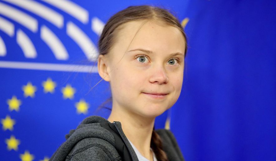 Swedish climate activist Greta Thunberg arrives for a meeting of the Environment Council at the European Parliament in Brussels, Wednesday, March 4, 2020. (AP Photo/Olivier Matthys) ** FILE **