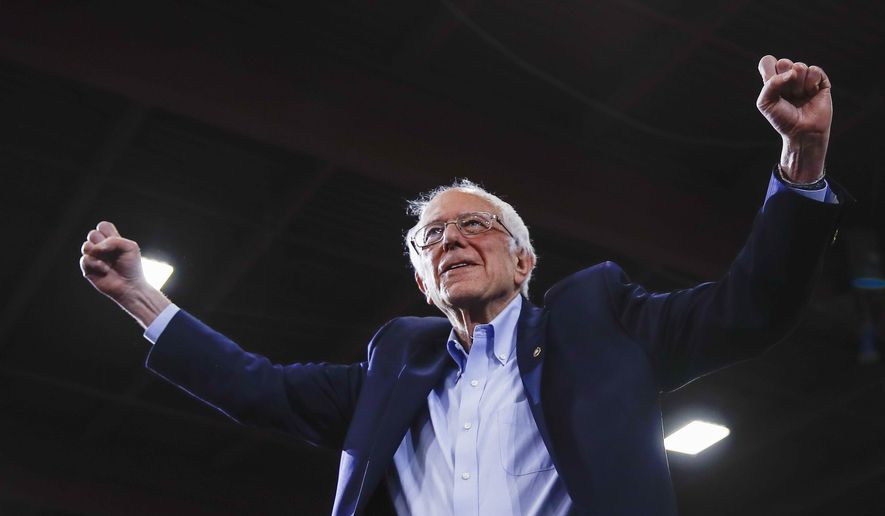 Democratic presidential candidate Sen. Bernie Sanders, I-Vt., arrives at a primary night election rally in Essex Junction, Vt., Tuesday, March 3, 2020. (AP Photo/Matt Rourke)
