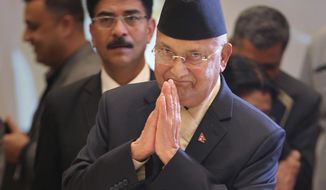 FILE- In this April 6, 2018 file photo, Nepalese Prime Minister Khadga Prasad Oli arrives for the inaugural ceremony of the India-Nepal business forum in New Delhi, India. Nepal&#x27;s popular communist prime minister is in the hospital awaiting his second kidney transplant after months of illness. (AP Photo/Altaf Qadri, File)