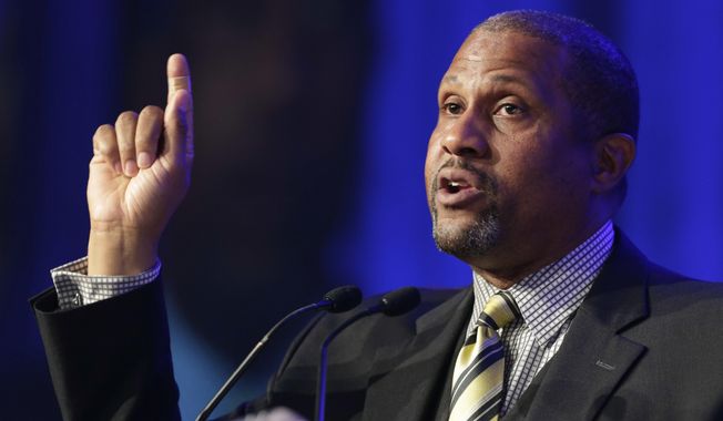 In this May 29, 2014 file photo, author and talk show host Tavis Smiley speaks at Book Expo America in New York.  A jury on Wednesday found that former talk show host Tavis Smiley violated the morals clause of his contract with the Public Broadcasting Service after allegations of workplace sexual misconduct, and must pay his former employer about $1.5 million. (AP Photo/Mark Lennihan, File)