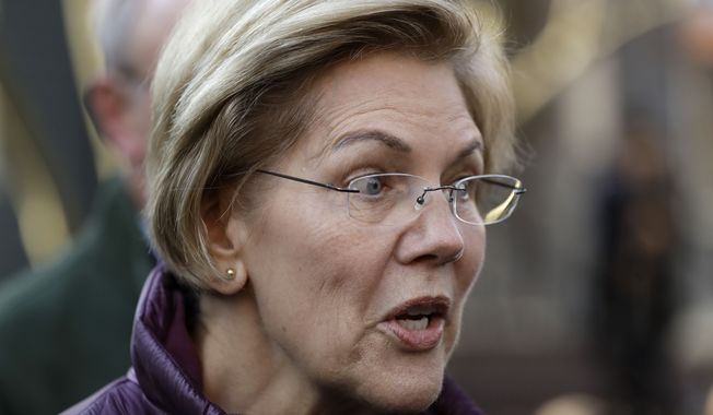 Sen. Elizabeth Warren, D-Mass., speaks to the media outside her home, Thursday, March 5, 2020, in Cambridge, Mass., after she dropped out of the Democratic presidential race. (AP Photo/Steven Senne)