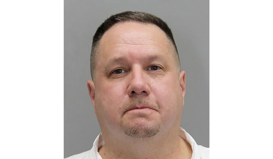 This undated photo provided by the Fairfax County Police Police shows Michael Hetle. Fairfax County police said Hetle, 52, was arrested on Tuesday, March 3, 2020, in the shooting death of Maryland National Guard Specialist Javon Prather, 24, in Springfield, Virginia. NASA said in a statement that Hetle works at its headquarters in Washington. (Fairfax County Police via AP)