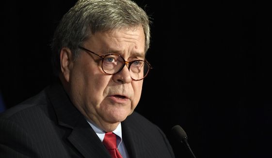In this Feb. 10, 2020, file photo, Attorney General William Barr speaks at the National Sheriffs&#39; Association Winter Legislative and Technology Conference in Washington. (AP Photo/Susan Walsh, File)