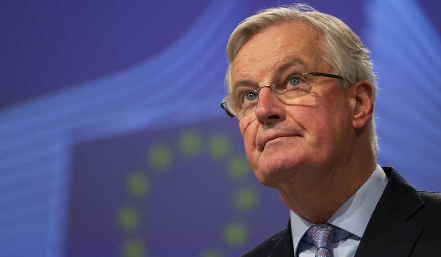 European Commission&#39;s Head of Task Force for Relations with the United Kingdom Michel Barnier speaks during a media conference at EU headquarters in Brussels, Thursday, March 5, 2020. The Brexit negotiators have said there are many divergences between the 27-country bloc and the UK after the first round of negotiations aimed at defining their future relationship. (AP Photo/Virginia Mayo)