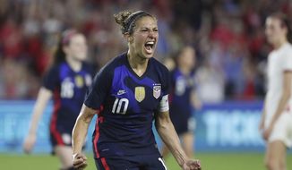 United States&#39; Carli Lloyd celebrates after scoring a goal against England during a She Believes Cup soccer match in Orlando, Fla., Thursday, March 5, 2020. (Stephen M. Dowell/Orlando Sentinel via AP)