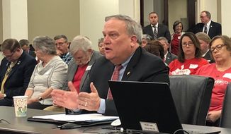 Kentucky Senate President Robert Stivers discusses a bill on Thursday, March 5, 2020, in Frankfort, Ky. Stivers’ bill to undo Gov. Andy Beshear’s reorganization of the Kentucky state school board won initial approval from the Senate Education Committee. (AP Photo/Bruce Schreiner)