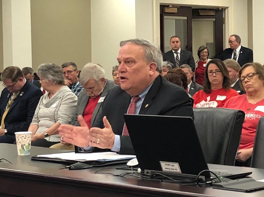 Kentucky Senate President Robert Stivers discusses a bill on Thursday, March 5, 2020, in Frankfort, Ky. Stivers’ bill to undo Gov. Andy Beshear’s reorganization of the Kentucky state school board won initial approval from the Senate Education Committee. (AP Photo/Bruce Schreiner)