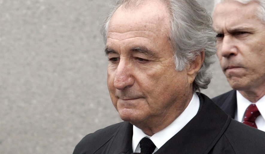 FILE- In this March 10, 2009 file photo, former financier Bernard Madoff exits Federal Court in New York. Citing the scope and magnitude of his decades-long Ponzi scheme that cost thousands of investors billions of dollars, federal prosecutors do not support a compassionate release from prison for 81-year-old Madoff, who may only have 18 months to live. (AP Photo/David Karp, File)