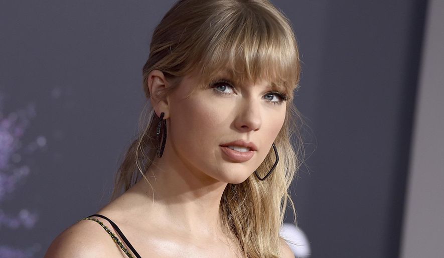 This Nov. 24, 2019, file photo shows Taylor Swift at the American Music Awards in Los Angeles. A spokesperson for  Swift confirms the pop star is donating $1 million to tornado relief efforts in Middle Tennessee. (Photo by Jordan Strauss/Invision/AP, File) 