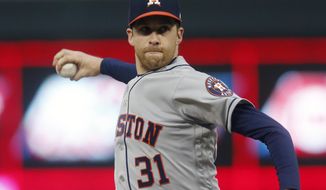 FILE - In this May 1, 2019, file photo, Houston Astros pitcher Collin McHugh throws against the Minnesota Twins in the first inning of a baseball game in Minneapolis. McHugh agreed to a $600,000, one-year contract with the pitching-needy Boston Red Sox, a deal that allows him earn up to $4.25 million. (AP Photo/Jim Mone, File)