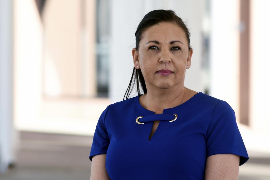 Suzy Shotts poses for a portrait, Wednesday, March 4, 2020, in downtown Denver. The sexual abuse survivor backs a bill being considered at the state Capitol to end the statute of limitations for sexual abuse lawsuits partly because it would help other survivors get compensation to help them rebuild their lives. (AP Photo/Thomas Peipert)