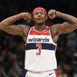 Washington Wizards guard Bradley Beal (3) gestures during the second half of an NBA basketball game against the Atlanta Hawks, Friday, March 6, 2020, in Washington. (AP Photo/Nick Wass)