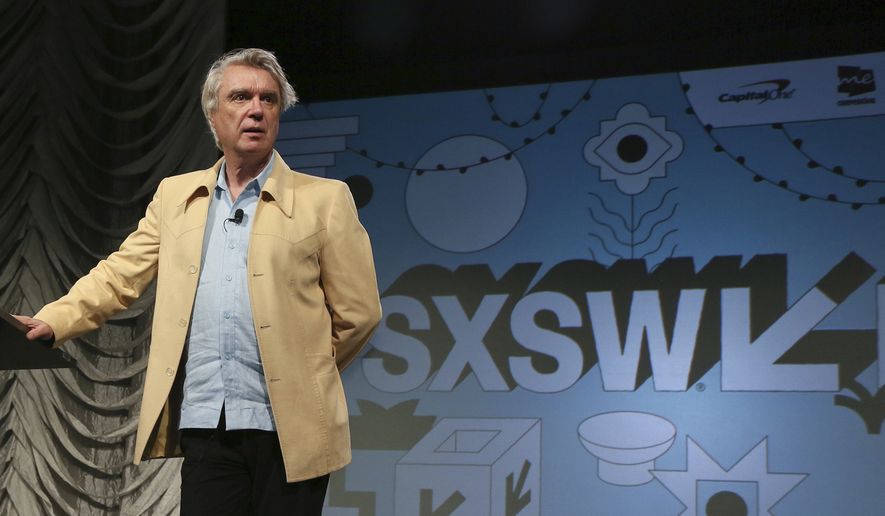  In this March 13, 2019, file photo, David Byrne takes part in the &quot;Reasons To Be Cheerful&quot; featured session during the South by Southwest Music Festival in Austin, Texas. Austin city officials have canceled the South by Southwest arts and technology festival. Mayor Steve Adler announced a local emergency that effectively canceled the annual event. (Photo by Jack Plunkett/Invision/AP, File) ** FILE **