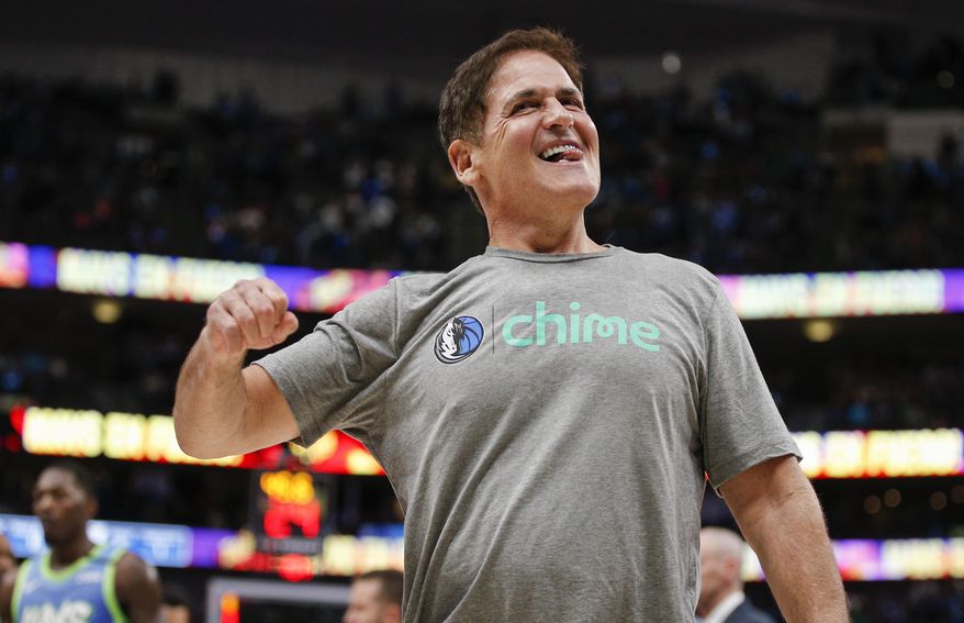 Dallas Mavericks owner Mark Cuban celebrates the team's 120-112 win over the Portland Trail Blazers in an NBA basketball game Friday, Jan. 17, 2020, in Dallas. (AP Photo/Brandon Wade)