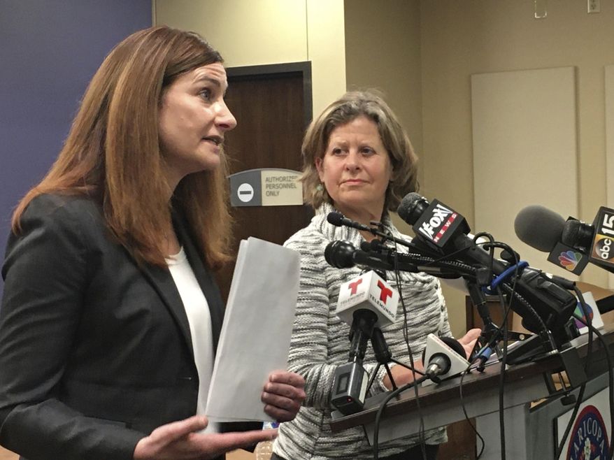 Dr. Rebecca Sunenshine, of Maricopa County Department of Public Health, left, and Dr. Shauna McIsaac, of Pinal County Department of Public Health, speak at a news conference in Phoenix on Friday, March 6, 2020. Arizona health officials said Friday that they have yet to determine how a third patient, a woman in her 40s, became infected with the coronavirus. (AP Photo/Terry Tang)