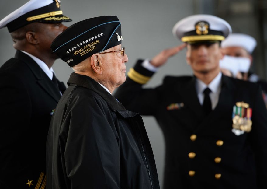 Medal of Honor Recipient and West Virginia native Hershel &quot;Woody&quot; Williams waits before going up on stage for the ceremony of the Commissioning of the USS Hershel &quot;Woody&quot; Williams in Norfolk, Va., Saturday, March 7, 2020. (Kenny Kemp/Charleston Gazette-Mail via AP)
