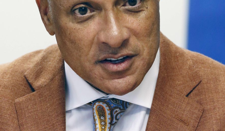 File - In this Oct. 5, 2018, file photo, Mike Espy, a former congressman and former U.S. agriculture secretary, is photographed in Jackson, Miss., and the Democrat will again try to beat incumbent Republican U.S. Sen. Cindy Hyde-Smith, after losing a competitive race to her in the 2018 special election. However, he must first beat two opponents in his party's primary on Tuesday, March 10. (AP Photo/Rogelio V. Solis, File)