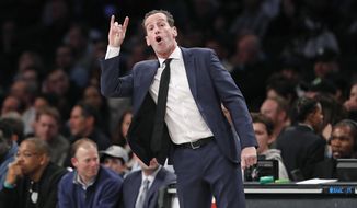 Brooklyn Nets head coach Kenny Atkinson gestures to his players during the second quarter of an NBA basketball game against the Memphis Grizzlies, Wednesday, March 4, 2020, in New York. (AP Photo/Kathy Willens)