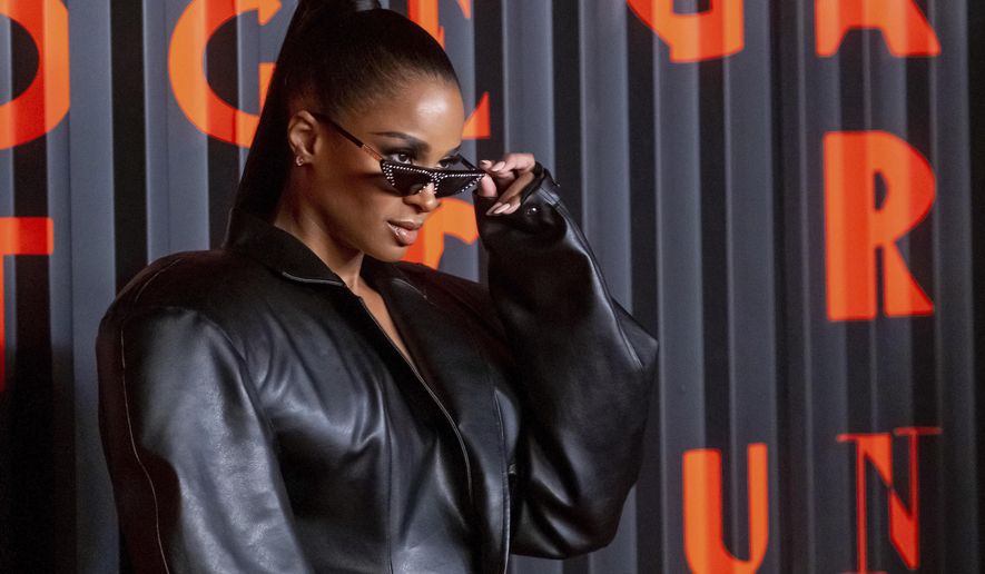 FILE - In this Feb. 6, 2020 file photo, Ciara attends the Bulgari New York Fashion Week party at Duggal Greenhouse in New York. Ciara is the latest musician to postpone a concert because of the rapidly spreading coronavirus.Ciara, who is pregnant, was set to perform in Texas at the grand opening of the new Fort Hood USO on March 19 but announced Saturday, March 7 that the event is being postponed. (Photo by Charles Sykes/Invision/AP, File)