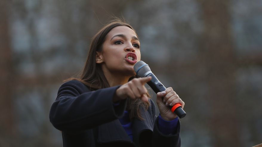 Rep. Alexandria Ocasio-Cortez, D-NY., speaks at a campaign rally for Democratic presidential candidate Sen. Bernie Sanders, I-Vt., at the University of Michigan in Ann Arbor, Mich., Sunday, March 8, 2020. (AP Photo/Paul Sancya)