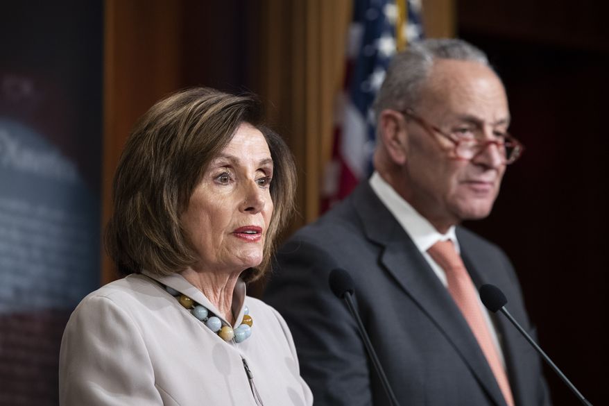 In this Tuesday, Feb. 11, 2020, file photo, House Speaker Nancy Pelosi, of California, joined by Senate Minority Leader Chuck Schumer of N.Y., speaks during a news conference, on Capitol Hill, in Washington.  (AP Photo/Alex Brandon, File)  **FILE**