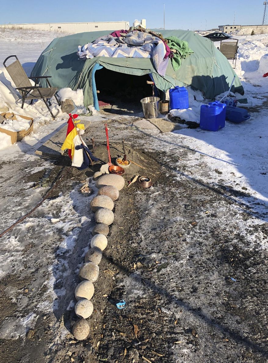 A Native American sweat lodge located on city property in an industrial area of south Fargo, N.D., is pictured on Thursday, Feb. 27, 2020. The lodge was shut down by the city in December over concerns that it was not being properly managed and was endangering the health of users. Native American leaders are working to find another location for the facility, which serves tribal members from the Dakotas, Minnesota and Canada. The nearest sweat lodges are on reservations hundreds of miles away. (AP Photo/Dave Kolpack)