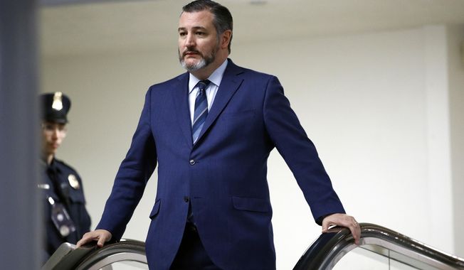FILE - In this Jan. 29, 2020, file photo, Sen. Ted Cruz, R-Texas, rides an escalator before speaking with reporters on Capitol Hill in Washington. GOP Sen. Cruz said Sunday, March 8, 2020, he will remain at his home in Texas after learning that he shook hands and briefly chatted with a man in suburban Washington who has tested positive for coronavirus. (AP Photo/Patrick Semansky, File)