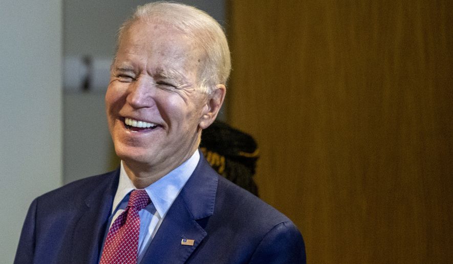 Democratic presidential candidate former Vice President Joe Biden makes a campaign stop at Cherry Health - Heart of the City Health Center in Grand Rapids, Mich., on Monday, March 9, 2020. (Cory Morse/The Grand Rapids Press via AP)