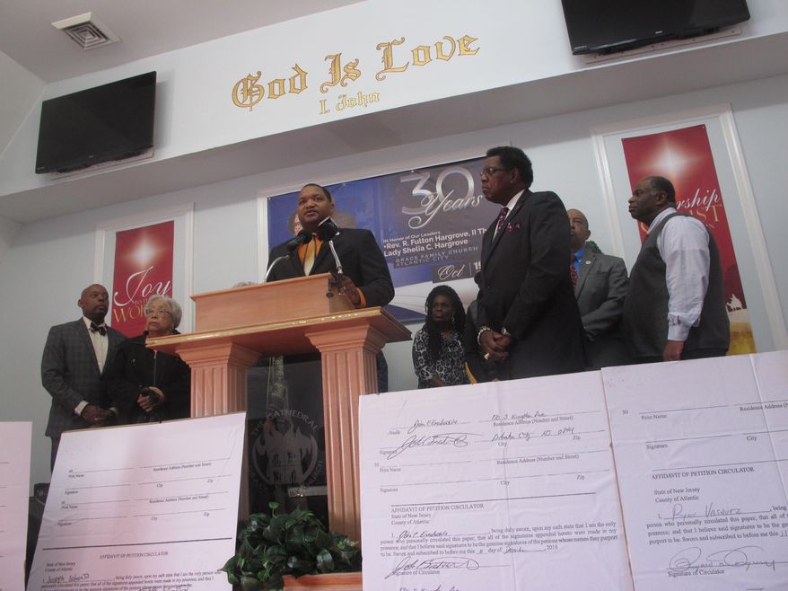 In this Jan. 15, 2020 photo, Atlantic City N.J. Mayor Marty Small speaks at a press conference in his city against a proposal to change the city's form of government by eliminating an elected mayor in favor of an appointed city manager. A judge will decide on March 10, 2020 whether the election scheduled for March 31 should be held as planned. (AP Photo/Wayne Parry)