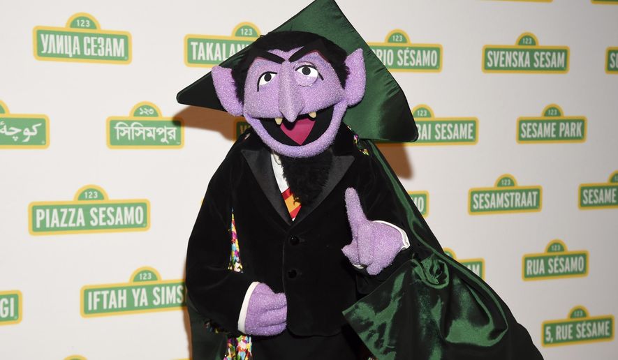 FILE - This May 30, 2018 file photo shows Sesame Street character Count von Count at Sesame Workshop's 16th annual Benefit Gala in New York. The Muppet best known as the Count is joining Elmo, Rosita and her mom, Rosa, in public service announcements airing Monday, March 9, 2020, to encourage parents of young children to make sure they and their children are counted in the 2020 census. (Photo by Evan Agostini/Invision/AP, File)
