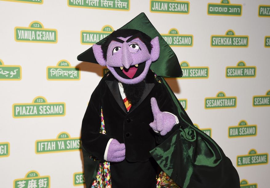 FILE - This May 30, 2018 file photo shows Sesame Street character Count von Count at Sesame Workshop's 16th annual Benefit Gala in New York. The Muppet best known as the Count is joining Elmo, Rosita and her mom, Rosa, in public service announcements airing Monday, March 9, 2020, to encourage parents of young children to make sure they and their children are counted in the 2020 census. (Photo by Evan Agostini/Invision/AP, File)