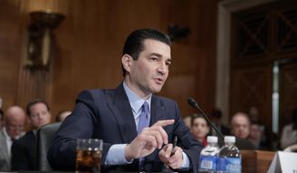 In this April 5, 2017, file photo, Dr. Scott Gottlieb, President Donald Trump's nominee to head the powerful Food and Drug Administration (FDA), speaks during his confirmation hearing before the Senate Committee on Health, Education, Labor, and Pensions, on Capitol Hill in Washington. (AP Photo/J. Scott Applewhite, File)