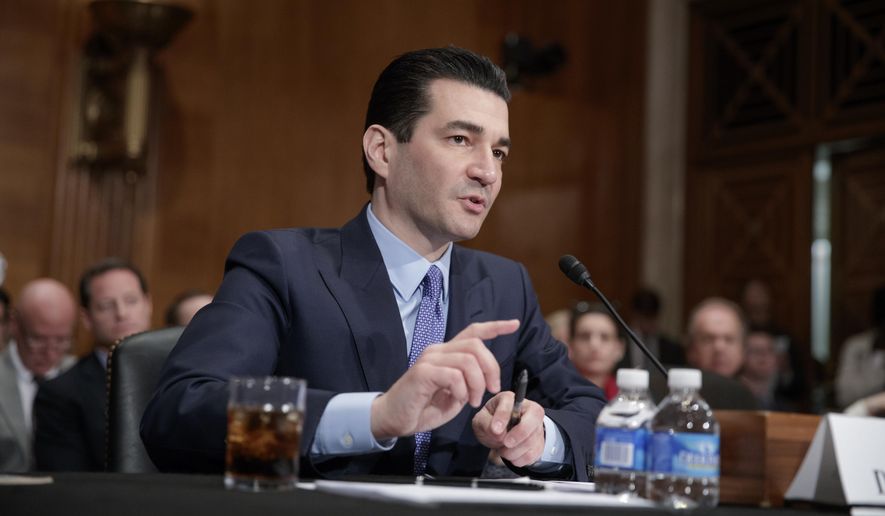 Dr. Scott Gottlieb, President Donald Trump&#x27;s then-nominee to head the powerful Food and Drug Administration (FDA), speaks during his confirmation hearing before the Senate Committee on Health, Education, Labor, and Pensions, on Capitol Hill in Washington. (AP Photo/J. Scott Applewhite, File)