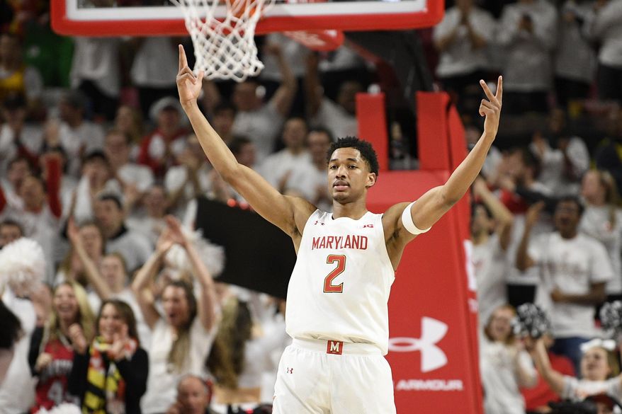 Maryland guard Aaron Wiggins (2) reacts after he made a three-point basket during the second half of an NCAA college basketball game against Michigan, Sunday, March 8, 2020, in College Park, Md. (AP Photo/Nick Wass) **FILE**