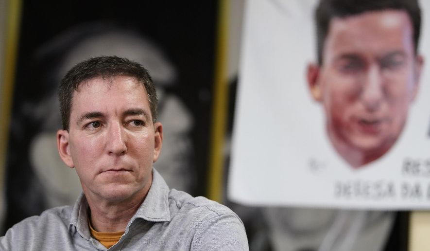 Award-winning journalist Glenn Greenwald listens to a question during a press conference before the start of a protest in his support in front of the headquarters of the Brazilian Press Association, known as ABI, in the city of Rio de Janeiro, Brazil, July 30, 2019. (AP Photo/Ricardo Borges) ** FILE **