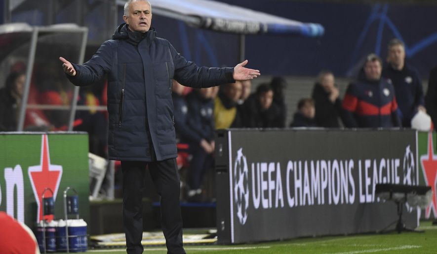 Tottenham coach Jose Mourinho gestures on the touchline during the Champions League round of 16, 2nd leg soccer match between RB Leipzig and Tottenham Hotspur in Leipzig, Germany, Tuesday, March 10, 2020. (Hendrik Schmidt/dpa via AP)