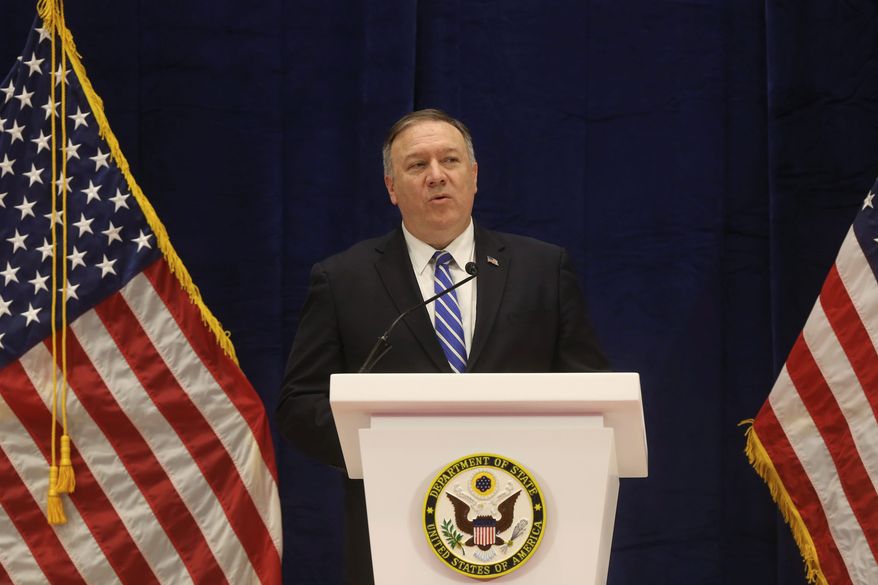 Secretary of State Mike Pompeo speaks to reporters after Taliban leaders and U.S. officials signed a peace agreement in Doha, Qatar, Saturday, Feb. 29, 2020. (AP Photo/Hussein Sayed) ** FILE **