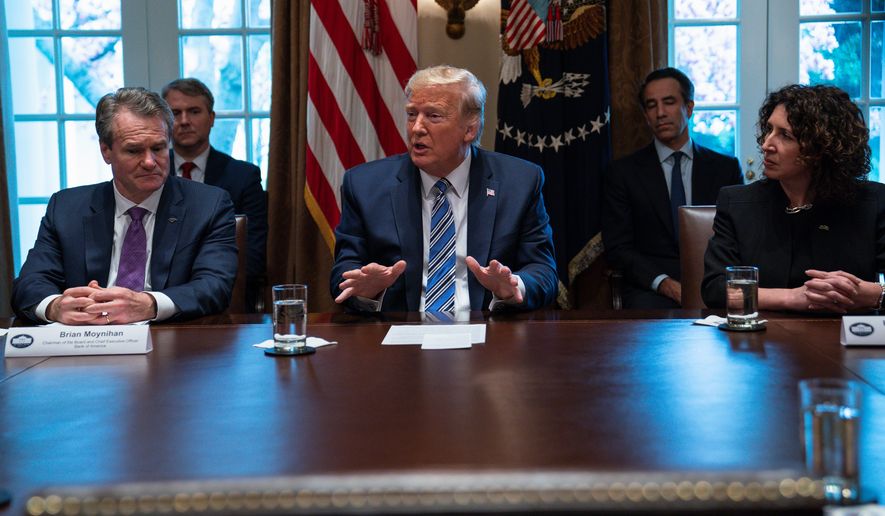 President Trump met with bankers and Wall Street executives at the White House on Wednesday including Bank of America CEO Brian Moynihan (left) and CEO of the Independent Community Bankers of America Rebeca Romero Rainey (right). All the people around the table attested to the health of the U.S. financial system. (Associated Press)
