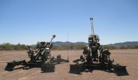 The U.S. Army&#39;s M777A2 and M777ER Howitzers are ready to fire on a range in September 2018. (Image: U.S. Army)  ** FILE ** 