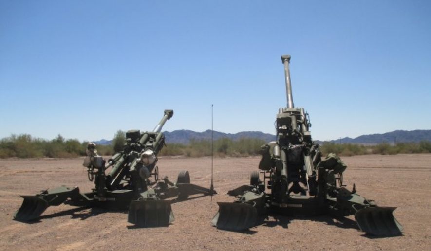 The U.S. Army&#x27;s M777A2 and M777ER Howitzers are ready to fire on a range in September 2018. (Image: U.S. Army)  ** FILE ** 