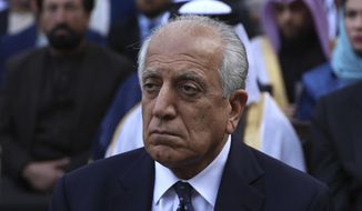 Washington&#39;s peace envoy Zalmay Khalilzad attends the inauguration ceremony for Afghan President Ashraf Ghani at the presidential palace in Kabul, Afghanistan, Monday, March 9, 2020. (AP Photo/Rahmat Gul) ** FILE **