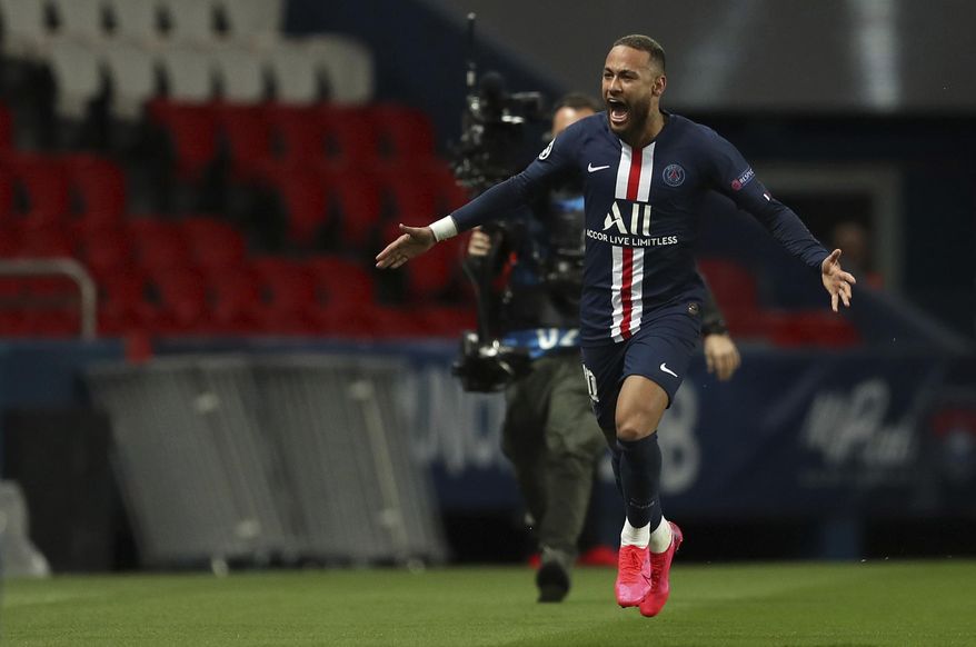 Paris Saint Germain's Neymar celebrates after scoring his side's first goal during the Champions League round of 16 second leg soccer match between PSG and Borussia Dortmund, Wednesday March 11, 2020 in Paris. The match is being played in an empty stadium because of the coronavirus outbreak. (UEFA via AP)