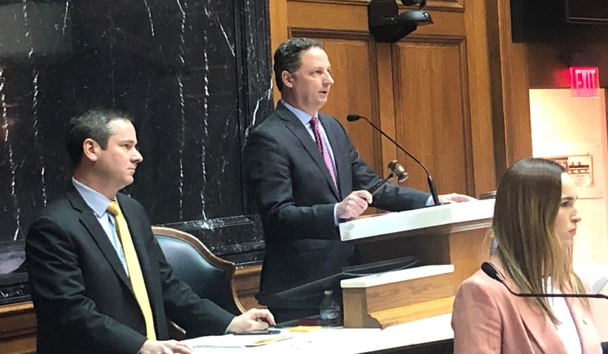 Indiana House Speaker Todd Huston speaks from the House podium during what is expected to be the final day of this year's legislative on Wednesday, March 11, 2020, at the Statehouse in Indianapolis. (AP Photo/Tom Davies)