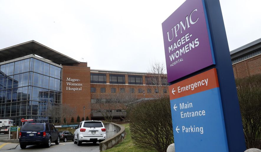 This is University of Pittsburgh Medical Center's Magee-Women's Hospital in Pittsburgh, March 10, 2020. Cherell Harrington, the lead plaintiff in a lawsuit filed Wednesday, March 11, 2020, naming Allegheny County and University of Pittsburgh Medical Center as defendants, gave birth to her third child at UPMC's Magee-Women's Hospital in November 2017. She says medical staff collected her urine without her consent and tested her for drugs. (AP Photo/Gene J. Puskar)