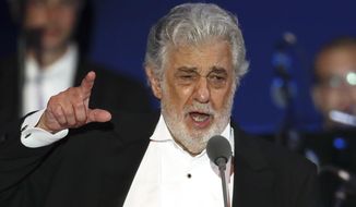FILE - In this Aug. 28, 2019, file photo, opera singer Placido Domingo performs during a concert in Szeged, Hungary. An investigation commissioned by the Los Angeles Opera into sexual harassment allegations against Domingo has found that the legendary tenor engaged in &amp;quot;inappropriate conduct&amp;quot; with multiple women over the three decades he held senior positions at the company, which he helped found and later led. Investigators deemed the allegations credible, according to a summary released Tuesday, March 10, 2020, by LA Opera. (AP Photo/Laszlo Balogh, File)