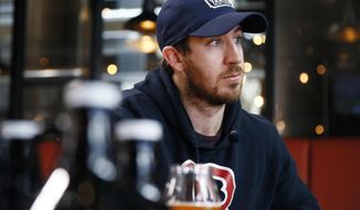 In this March 9, 2020, photo, Philadelphia Flyers&#39; Kevin Hayes speaks during an interview with The Associated Press at Yards Brewing Company, in Philadelphia. Hayes’ addition has been a big part of the Flyers success, his popularity soaring to the point there’s now a Big Hayes-y IPA on tap at Yards Brewery. (AP Photo/Matt Slocum)