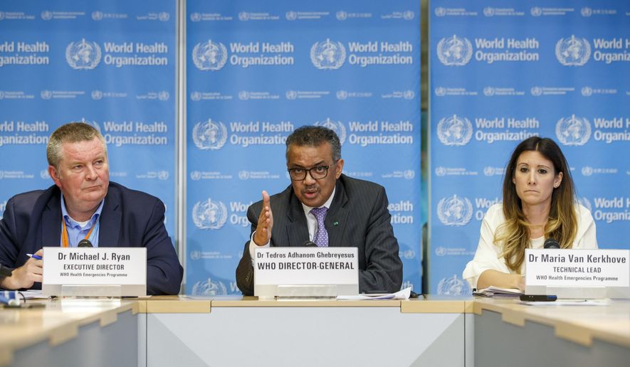 In this Monday, March 9, 2020 photo, Tedros Adhanom Ghebreyesus, director general of the World Health Organization speaks during a news conference on updates regarding on the novel coronavirus COVID-19, at the WHO headquarters in Geneva, Switzerland. Accompanying him are Michael Ryan, left, executive director of WHO&#39;s Health Emergencies program, and Maria van Kerkhove, right, technical lead of WHO&#39;s Health Emergencies program. On Wednesday, March 11, 2020, the WHO declared the new coronavirus a pandemic, suggesting the disease is spreading across the globe unchecked. (Salvatore Di Nolfi/Keystone via AP)